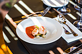 View of appetizer with shrimp on plate on table