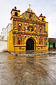 Colorful facade of Church of San Andres Xecul, Guatemala