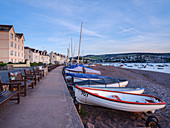 Boats and benches lined up along the top of the beach at Shaldon, Devon, England, United Kingdom, Europe