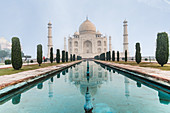 Taj Mahal reflections on a misty morning, UNESCO World Heritage Site, Agra, Uttar Pradesh, India, Asia
