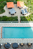 High angle view of tables at hotel swimming pool, Miami, Florida, USA