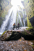 Iceland, road trip, midsummer night, mountain bike, MTB, e-bike, cyclist, cave, waterfall