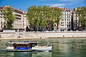 France, Rhone, Lyon, historical site listed as World Heritage by UNESCO, the river taxi connecting the 1st district with the district of La Confluence