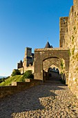 France, Aude, Carcassonne, medieval city listed as World Heritage by UNESCO, the ramparts on the western side by Porte d'Aude (Aude Gate)