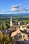View from the upper town to the lower town with its church, Bonnieux in the Luberon, Provence, France
