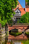 Millers' Guild House, canal of Radunia, Chlebowy bridge also called bridge of love, because young people hang padlocks there. Gdansk, Main City, Pomorze region, Pomorskie voivodeship, Poland, Europe