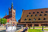 St. Catherine's church, and old Great City Mill on Radunia canal, fountain at Hevelius square. Gdansk, Main City, Pomorze region, Pomorskie voivodeship, Poland, Europe