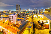 View of hotel rooftop bar and Tel Aviv skyline at dusk, Jaffa visible in the background, Tel Aviv, Israel, Middle East