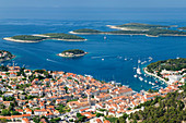 Elevated view of the old town and Pakleni Islands, Hvar Island, Dalmatia, Croatia, Europe