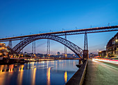 Dom Luis I Bridge and Douro River at dusk, Porto, Portugal, Europe