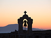 Silhouette des Glockenturms der Kirche in der Fortezza, Sonnenuntergang, Rethymno (Rethymnon), Kreta, griechische Inseln, Griechenland, Europa