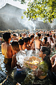 Pilgrims queuing to bathe in the sacred Tampaksiring Spring, Pura Tirta Empul Temple, Ubud, Bali, Indonesia, Southeast Asia, Asia