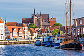 Old Town in Wismar viewed from Alter Hafen (old port), On the left half-timbered house called GewÃ¶lbe (vault), Fachwerkhaus, Runde Grube, St. Georgen church, Wismar stadt, Mecklenburgâ€“Vorpommern, Germany.