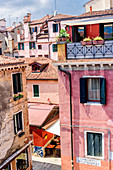 House with red facade, Venice, Italy