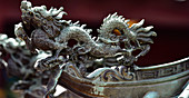 A dragon decorating a temple roof in Chinatown, Singapore