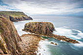 Enys Dodnan rock formation at Lands End, Cornwall, England, United Kingdom, Europe