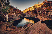 Sunset in the Hamersley Gorge in Karijini National Park in Western Australia, Australia, Oceania;