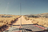 Fahrt mit dem Allrad Fahrzeug im Outback in der Nähe von Coral Bay in Westaustralien, Australien, Ozeanien