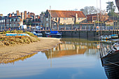 A view of the quayside on the North Norfolk coast at Blakeney, Norfolk, England, United Kingdom.