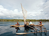 Papua New Guinea - November 8, 2010:  A group of smiling people on a boat.