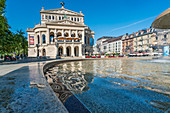 View of the Alte Oper and a fountain in Frankfurt, Germany