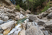 River course with turquoise clear water on the Samaria Gorge hike, West Crete, Greece