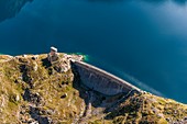 France, Hautes Pyrenees, Louron valley, Lake of Caillauas (2160 m), dam (aerial view)