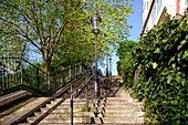 France, Paris, Montmartre district, Staircase leading towards the basilica Sacre-Coeur crowning the Montmartre hill