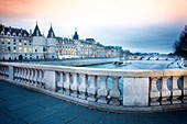 France, Paris, area listed as World Heritage by UNESCO, La Conciergerie over the Seine river