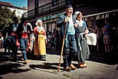 France, Ariege, St Girons, Autrefois le Couserans, scene of life during the days of rural animations on the old jobs of yesteryear in the Couserans, folk parade in the streets of StGirons
