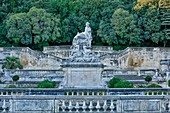 France, Gard, Nimes, the Fontaine gardens, stairs surrounding the nymphaeum