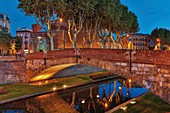 France, Pyrenees Orientales, Perpignan, Castillet, bridge on La Basse night