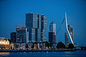 View over the New Meuse towards the illuminated Zuid and Kop van Zuid districts during the blue hour, Rotterdam, Netherlands, June 2020