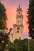 View from park of Merida Cathedral at sunset, Yucatan, Mexico