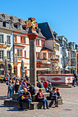 Market cross with Petrusbrunnen at the main market, Trier, Mosel, Rhineland-Palatinate, Germany