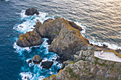 Aerial view of Cape Ortegal lighthouse at sunrise. Carino, La Corona, Galicia, Spain