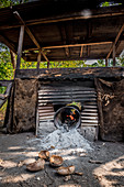 Copra drying in the oven, Malekula, Vanuatu, South Pacific, Oceania