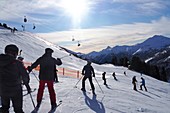 In Obertauern, ski area, pass, snow, sun, ski slopes, skiers, winter in Salzburg, Austria