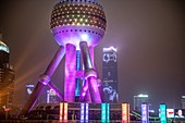 The colorfully lit Oriental Pearl TV Tower in Shanghai, China.
