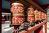 Prayer wheels in Buddhist monastery in Marpha village, Lower Mustang, Mustang district, Nepal