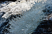 Close up of the spray in the waterfall, Ramsele, Västernorrland, Sweden