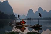 Cormorant Fisherman Lighting Lamp for Night Fishing\nGuilin Region\nGuangxi, China\nLA008334\n