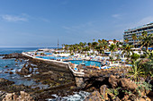 Spain,Canary Islands,Tenerife,Valle de La Orotava,Puerto de La Cruz,view of Lago Martiánez, a saltwater pool complex designed by architect César Manrique