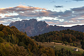 Sunset at the huts of Alpe Blitz, in front of Monte Limidario, Craveggia, Val Vigezzo, Piedmont, Italy.