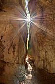 Sun shines through narrow crevice in the Gorges de Regalon, Gorges de Regalon, Luberon Natural Park, Vaucluse, Provence-Alpes-Cote d´Azur, France