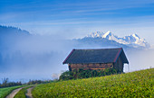 Kleiner Stadel at Geroldsee in autumn morning mist, Krün, Germany