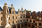 On the roofs of the Schwerin Castle surrounded by towers, domes, chimneys, Mecklenburg-Western Pomerania, Germany