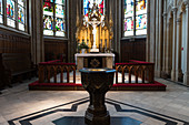 Baptismal bowl in front of the altar in the castle church in Schwerin. It is a Protestant church from the 15th century, Mecklenburg-Western Pomerania, Germany