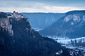 Distant view of Werenwag Castle in the Upper Danube Valley Nature Park near Sigmaringen in winter, Swabian Alb, Baden-Wuerttemberg, Germany, Europe