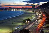 Copacabana Beach, and Avenue Atlantica at night, Copacabana, Rio de Janeiro, Brazil